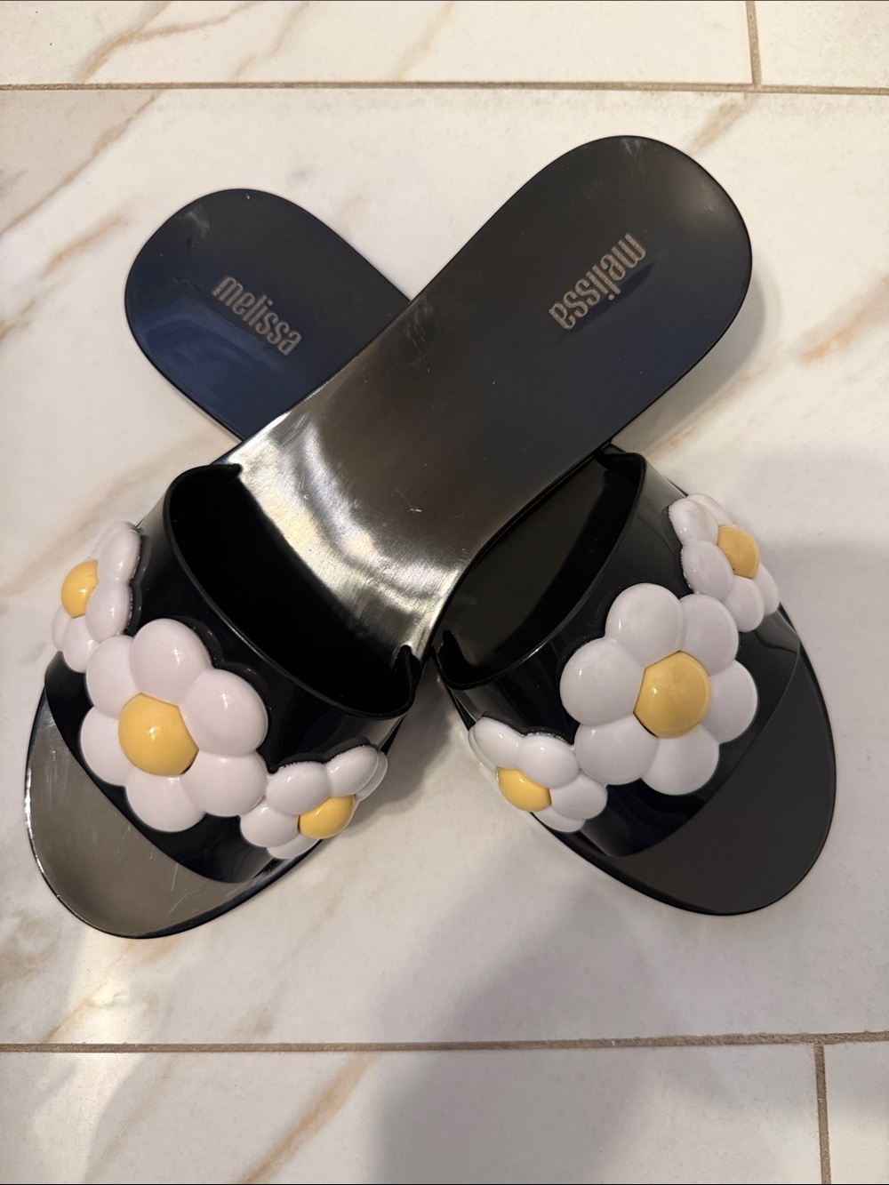 Melissa Black Slide Sandals with White and Yellow Daisy Appliqués